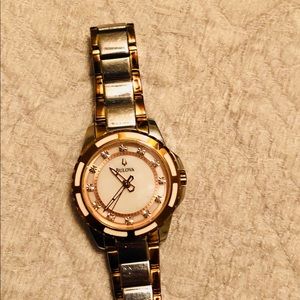 Bulova diamond two toned watch.